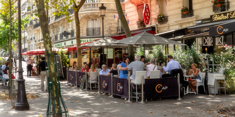 Local Parisians dining at a sidewalk cafe in the 15th Arrondissement