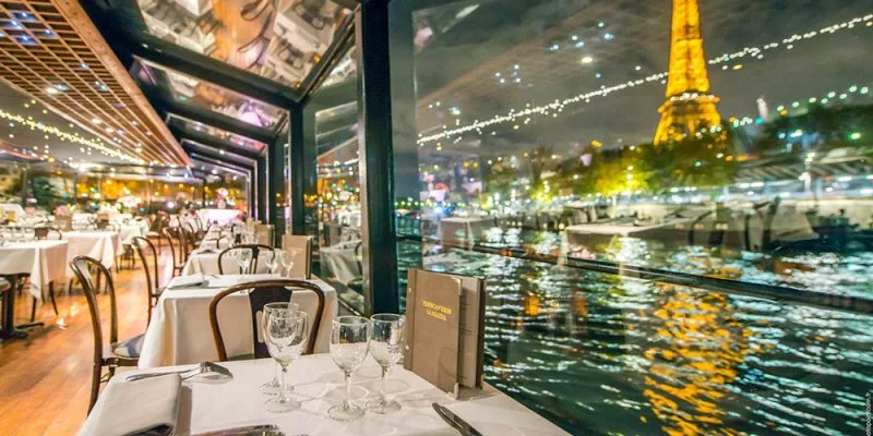 The Eiffel Tower and the Seine River seen from a dinner cruise boat