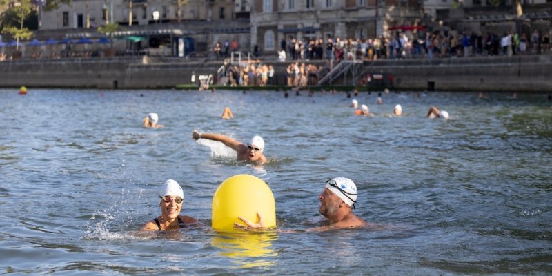 Swimmers enjoying the waterways of Paris