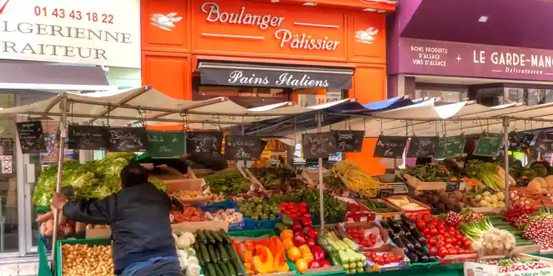 Stalls and food shops at the Aligre market, photo by Mark Craft, 2012