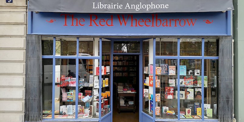 The sign and display windows of the Red Wheelbarrow bookstore
