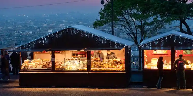 Christmas market chalets in Montmartre at night