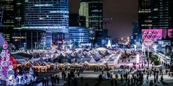 La Défense Christmas Market filling the Parvis at night