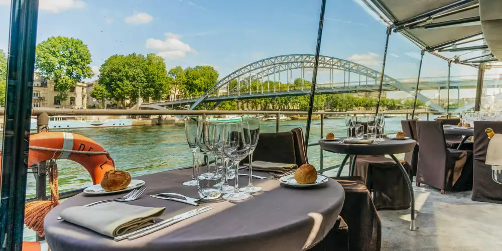 The view from a window table during a Bateaux Parisiens lunch cruise