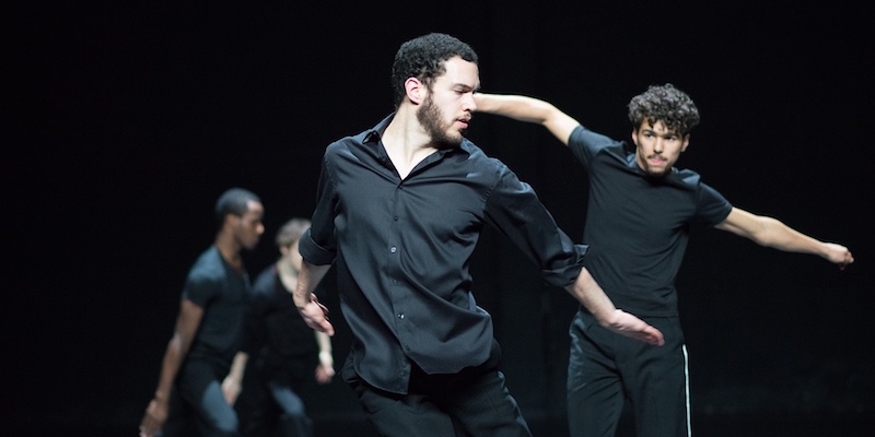 Men performaing a dance number as part of Le Festival d'Automne