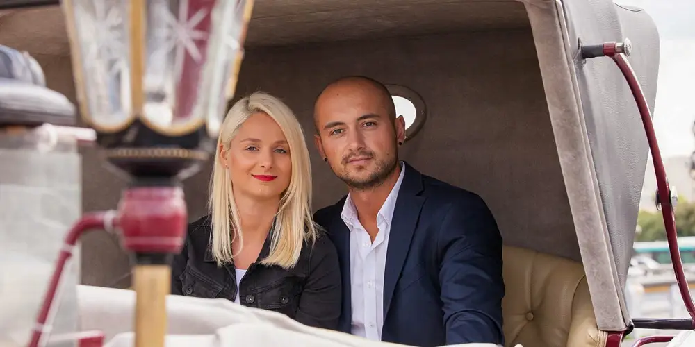 Comfortably seated in a luxe carriage, ready for a slow Paris tour