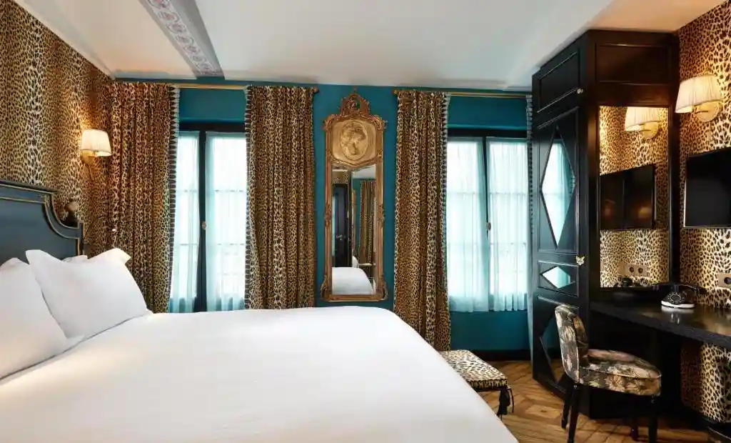 A room at Hotel de Josephine Bonaparte showing the rich coors and attention to detail