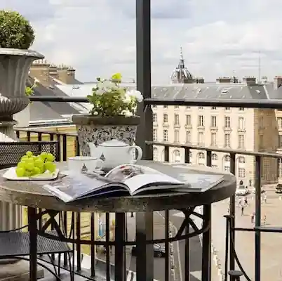 Hotel balcony view over Paris rooftops near the Pantheon