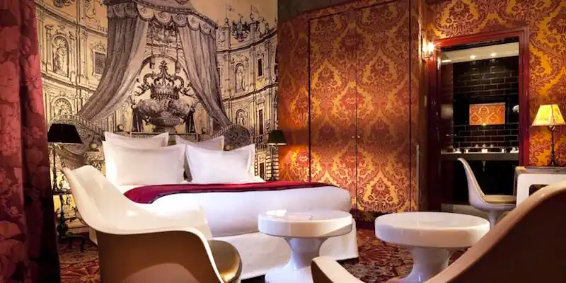 A design by Christian Lacroix set Hotel du Petit Moulin apart