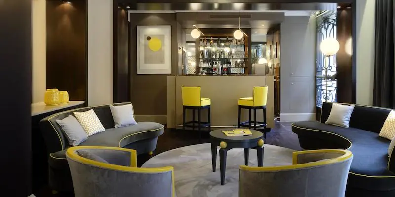 Clean lines and comforting colors are key in Le Marquis' bar