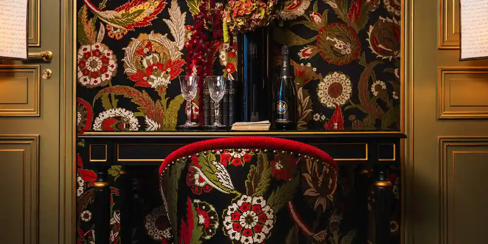 The use of fabrics and traditional colors give Maison Proust its distinct look
