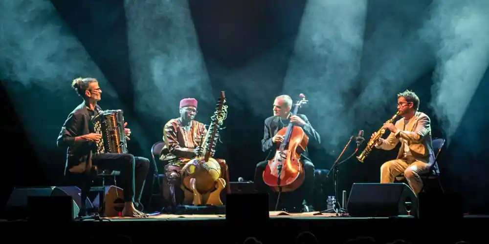 Roberto Fonseca and Vincent Segal performing with musicians at Jazz à la Villette