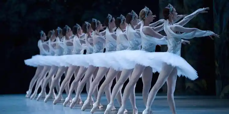 Corps de ballet performing in a classical ballet production