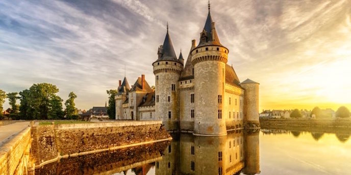 Loire Valley chateau at sunset with yellow tones