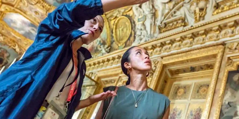 Visitors on a guided tour of the Louvre
