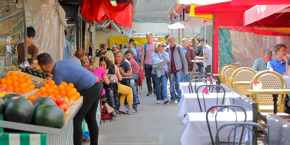 Shoppers and food stalls at Marché des Enfants Rouges Paris, photo by tktktk