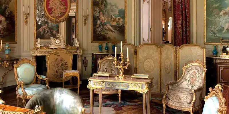 An ornate sitting room at Nissim de Camondo Museum features furniture by French master craftsmen