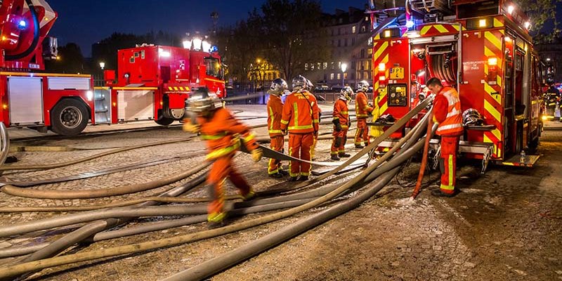 Firefighters at the scene of the Notre Dame fire