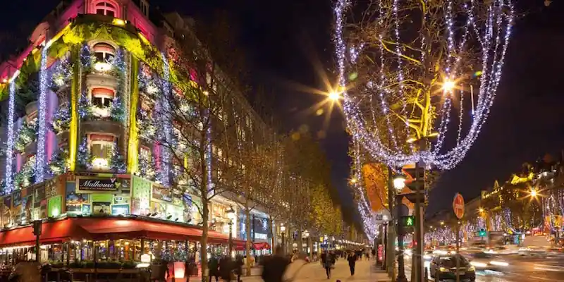 Christmas lights along the Champs-Elysées in Paris at night