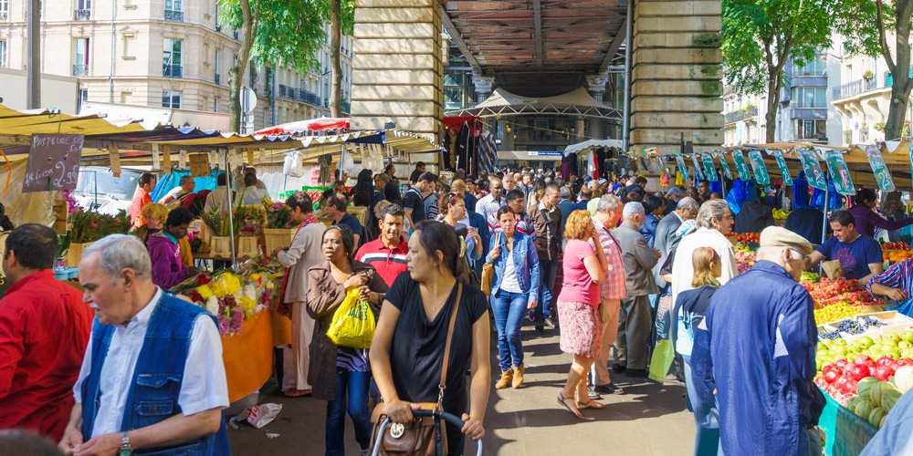The busy Grenelle market, under Metro Line 6