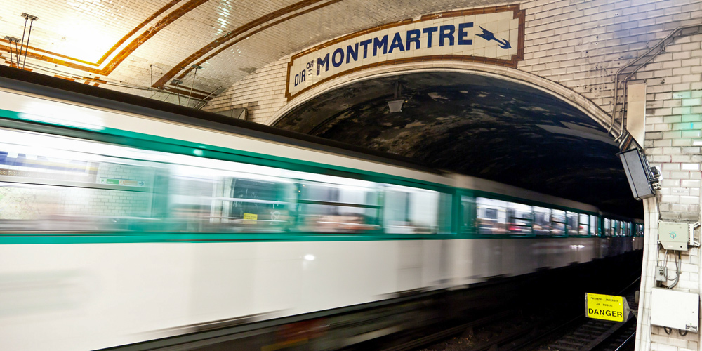 A speeding Metro train heading the Montmartre