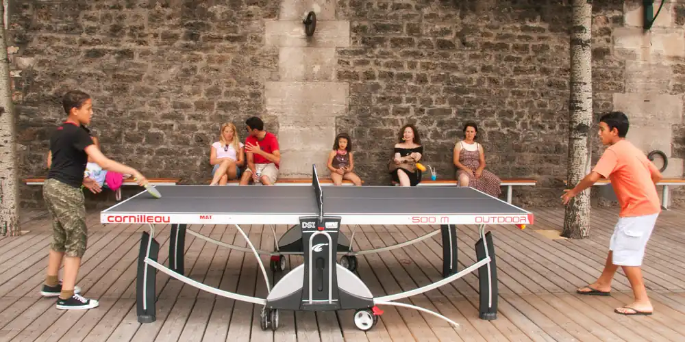 Playing ping-pong at Paris Plages