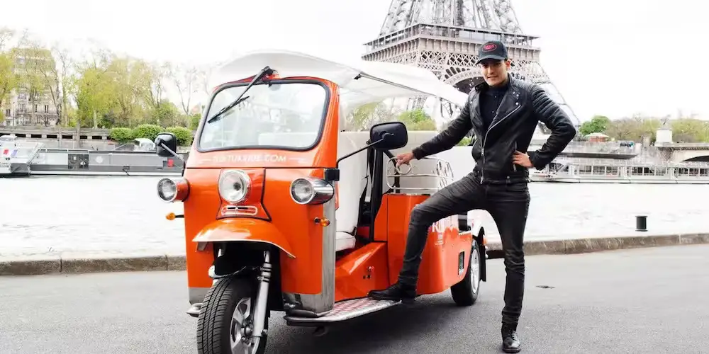 Cute-as-a-bug Tu Tuk near the Eiffel Tower