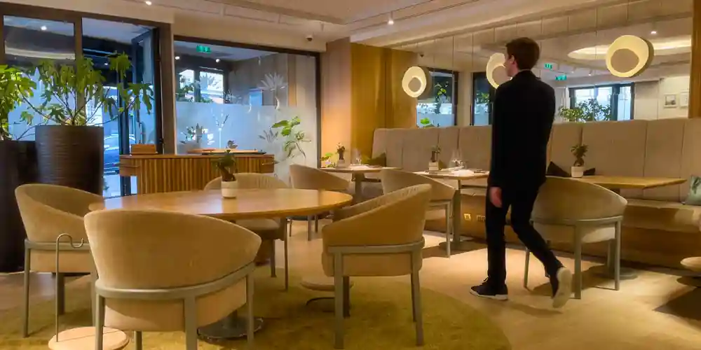 Modern Michelin-star restaurant dining room in Paris