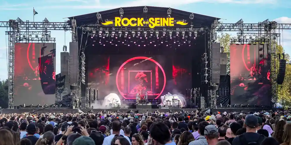 Crowd gathered in front of the main stage at the Rock en Seine music festival in Domaine national de Saint-Cloud