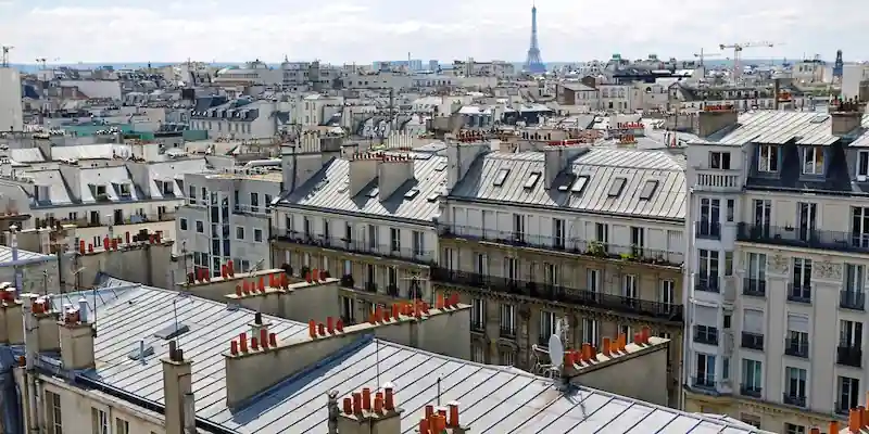 A sommelier pours wine during a tasting in Paris