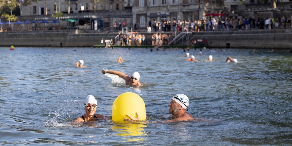 Swimmers enjoying the waterways of Paris