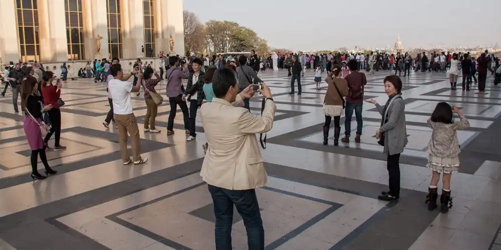 Trocadero terrace with people and patterned paving in Paris