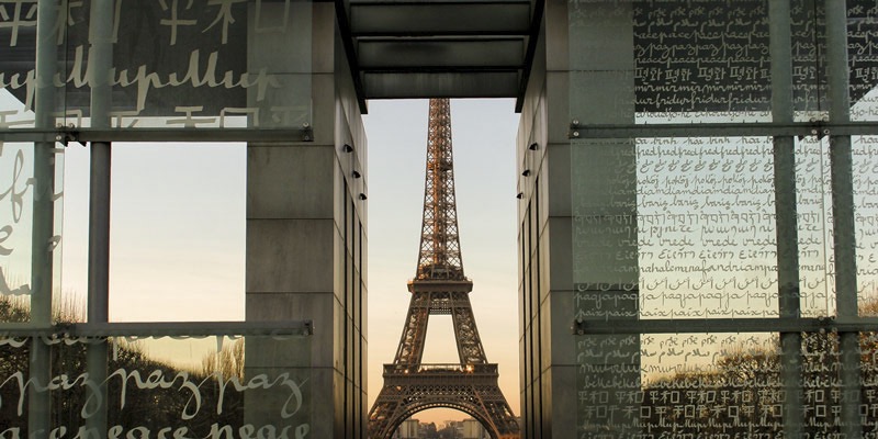 View of the Eiffel Tower looking through the Wall for Peace monument