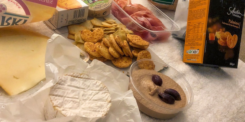 Food on Paris hotel bed